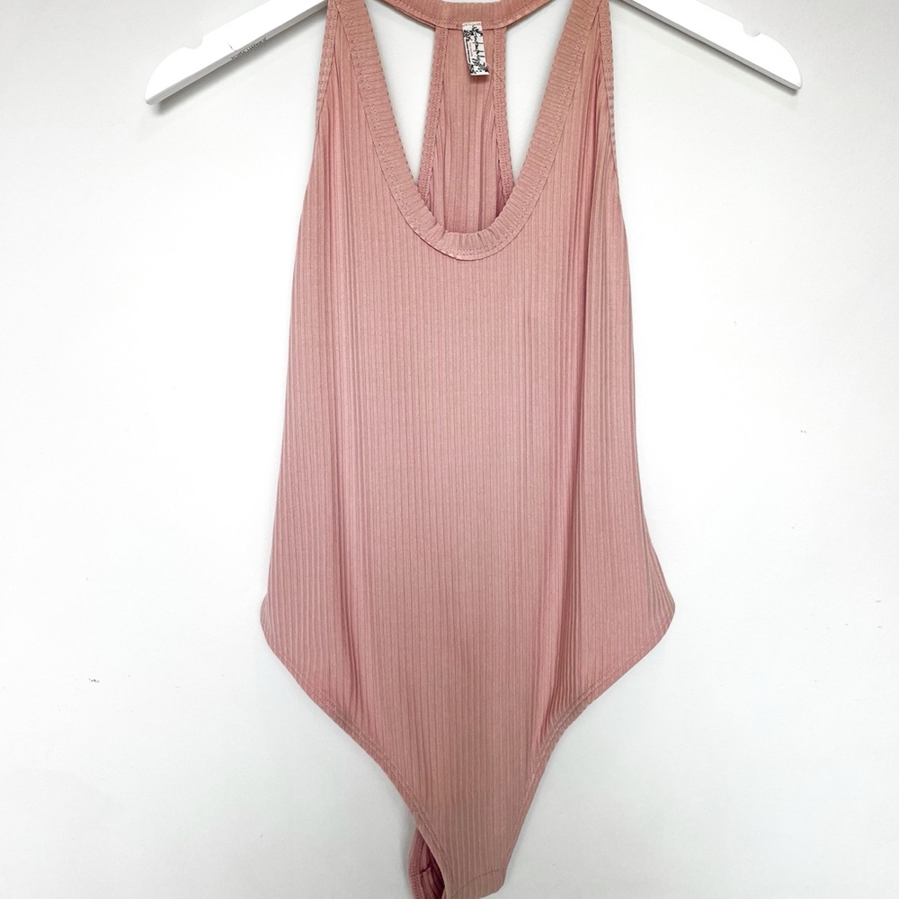 Free People Speed Dial Bodysuit in bubble bath.